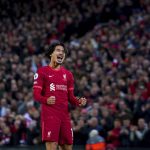 
              Liverpool's Takumi Minamino celebrates after scoring his side's fourth goal during the English Premier League soccer match between Liverpool and Arsenal at Anfield Stadium, Liverpool, England, Saturday, Nov. 20, 2021 (Peter Byrne/PA via AP)
            