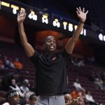 
              Oklahoma State head coach Mike Boynton gestures in the first half of an NCAA college basketball game against UMass Lowell, Tuesday, Nov. 16, 2021, in Uncasville, Conn. (AP Photo/Jessica Hill)
            