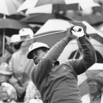 
              FILE - Lee Elder watches the flight of his ball as he tees off in the first round of play at the Masters in Augusta, Ga., in this April 10, 1975, file photo. Elder broke down racial barriers as the first Black golfer to play in the Masters and paved the way for Tiger Woods and others to follow. The PGA Tour confirmed Elder’s death, which was first reported by Debert Cook of African American Golfers Digest. No cause or details were immediately available, but the tour said it spoke with Elder's family. He was 87. (AP Photo/File)
            
