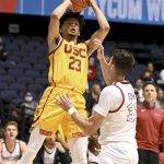 
              Southern California forward Max Agbonkpolo shoots a basket over Saint Joseph's forward Taylor Funk in the first half of an NCAA college basketball game at the Wooden Legacy tournament in Anaheim, Calif., Thursday, Nov. 25, 2021. (AP Photo/Jayne Kamin-Oncea)
            