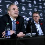 
              Winnipeg Jets general manager Kevin Cheveldayoff, left, listens to reporters' questions during a news conference with Jets owner Mark Chipman, right, Tuesday, Nov. 2, 2021, in Winnipeg, Manitoba. The Chicago Blackhawks held settlement talks Tuesday with attorney for a former player who is suing the team after he accused an assistant coach of sexual assault in 2010 and the team largely ignored the allegations. Cheveldayoff was the Blackhawks' GM for two seasons, 2009-2011. The NHL decided not to discipline Cheveldayoff based on his limited role in Chicago’s front office at the time. (Fred Greenslade/The Canadian Press via AP)
            
