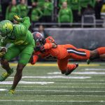 
              Oregon wide receiver Devon Williams (2) gets away from Oregon State defensive back Alex Austin (5) after a catch in the second quarter of an NCAA college football game Saturday, Nov. 27, 2021, in Eugene, Ore. (AP Photo/Andy Nelson)
            