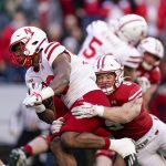 
              Wisconsin linebacker Leo Chenal (5) tackles Nebraska running back Markese Stepp during the first half of an NCAA college football game Saturday, Nov. 20, 2021, in Madison, Wis. (AP Photo/Andy Manis)
            