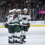 
              Minnesota Wild players celebrate a goal against the Vegas Golden Knights during the third period of an NHL hockey game Thursday, Nov. 11, 2021, in Las Vegas. (AP Photo/Eric Jamison)
            
