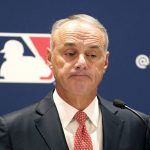 
              Major League Baseball commissioner Rob Manfred listens to a question Thursday, Nov. 18, 2021, during a news conference in Chicago. (AP Photo/Charles Rex Arbogast)
            