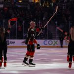 
              Anaheim Ducks center Ryan Getzlaf (15) is honored after their 3-2 win in overtime against the Washington Capitals in an NHL hockey game in Anaheim, Calif., Tuesday, Nov. 16, 2021. Getzlaf scored his 1,000th goal. (AP Photo/Ashley Landis)
            