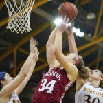 
              Indiana guard Grace Berger (34) shoots during the first half of the team's NCAA college basketball game against Quinnipiac on Saturday, Nov. 20, 2021, in Hamden, Conn. (AP Photo/Bryan Woolston)
            