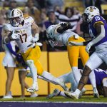 
              Louisiana-Monroe wide receiver Boogie Knight (17) carries on a touchdown reception in the first half of an NCAA college football game against LSU in Baton Rouge, La., Saturday, Nov. 20, 2021. (AP Photo/Gerald Herbert)
            