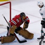
              San Jose Sharks right wing Timo Meier, right, scores against Chicago Blackhawks goaltender Marc-Andre Fleury during the second period of an NHL hockey game in Chicago, Sunday, Nov. 28, 2021. (AP Photo/Nam Y. Huh)
            