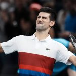 
              Novak Djokovic of Serbia celebrates his win over Hubert Hurkacz of Poland, during their semifinal match at the Paris Masters tennis tournament at the Accor Arena, in Paris, France, Saturday, Nov. 6, 2021. (AP Photo/Thibault Camus)
            