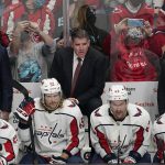 
              Washington Capitals head coach Peter Laviolette, middle, watches during the third period of is team's NHL hockey game against the San Jose Sharks in San Jose, Calif., Saturday, Nov. 20, 2021. (AP Photo/Jeff Chiu)
            