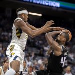 
              Indiana Pacers center Myles Turner, front left, defends against Sacramento Kings forward Harrison Barnes (40) during the first half of an NBA basketball game in Sacramento, Calif., Sunday, Nov. 7, 2021. (AP Photo/José Luis Villegas)
            