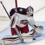 
              Columbus Blue Jackets goaltender Joonas Korpisalo makes a pad save on a shot by the Colorado Avalanche during the first period of an NHL hockey game Wednesday, Nov. 3, 2021, in Denver. (AP Photo/David Zalubowski)
            