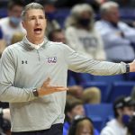 
              Robert Morris head coach Andrew Toole directs his team during the first half of an NCAA college basketball game against Kentucky in Lexington, Ky., Friday, Nov. 12, 2021. (AP Photo/James Crisp)
            