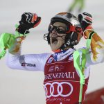 
              Slovakia's Petra Vlhova celebrates after winning an alpine ski, World Cup women's slalom in Levi, Finland, Sunday, Nov. 21, 2021. (AP Photo/Alessandro Trovati)
            