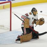 
              Chicago Blackhawks goaltender Marc-Andre Fleury deflects the puck after stopping a shot during the second period of an NHL hockey game against the Seattle Kraken, Wednesday, Nov. 17, 2021, in Seattle. (AP Photo/Ted S. Warren)
            