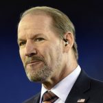 
              FILE - Bill Cowher stands on the field before an NFL football game between the Baltimore Ravens and the Miami Dolphins, Thursday, Oct. 26, 2017, in Baltimore. Hall of Fame coach Cowher recognizes that running an NFL team is like being a CEO and being aware of everything happening inside and outside of the team. (AP Photo/Gail Burton, File)
            