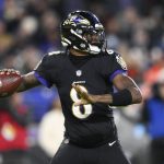 
              Baltimore Ravens quarterback Lamar Jackson looks to pass against the Cleveland Browns during the first half of an NFL football game, Sunday, Nov. 28, 2021, in Baltimore. (AP Photo/Nick Wass)
            