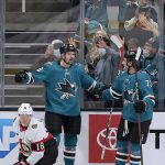 
              San Jose Sharks center Tomas Hertl is congratulated by Noah Gregor (73) after scoring a goal, as Ottawa Senators left wing Tim Stutzle (18) looks away during the second period of an NHL hockey game Wednesday, Nov. 24, 2021, in San Jose, Calif. (AP Photo/Tony Avelar)
            