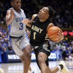
              Army's Jalen Rucker (1) drives against Duke's Jeremy Roach (3) during the first half of an NCAA college basketball game in Durham, N.C., Friday, Nov. 12, 2021. (AP Photo/Ben McKeown)
            