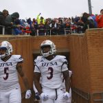 
              UTSA players enter the field before the first half of an NCAA college football game against North Texas in Denton, Texas, Saturday, Nov. 27, 2021. (AP Photo/Andy Jacobsohn)
            