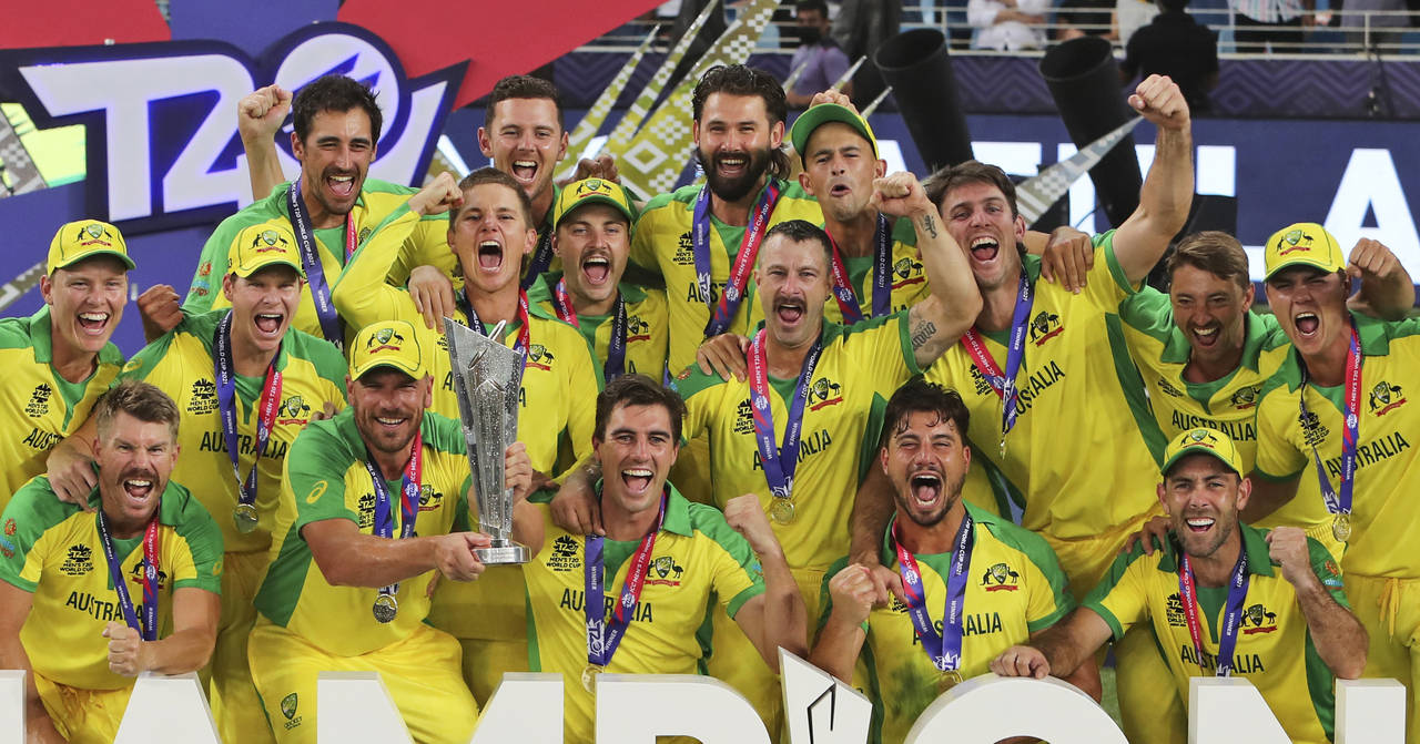 Australian cricketers celebrate after winning the Cricket Twenty20 World Cup final match in Dubai, ...