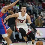 
              Miami Heat guard Tyler Herro (14) is defended by Detroit Pistons guard Cory Joseph during the second half of an NBA basketball game, Tuesday, Nov. 23, 2021, in Detroit. (AP Photo/Carlos Osorio)
            