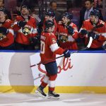 
              Florida Panthers right wing Patric Hornqvist (70) is congratulated by teammates after scoring a goal against the Seattle Kraken during the first period of an NHL hockey game Saturday, Nov. 27, 2021, in Sunrise, Fla. (AP Photo/Jim Rassol)
            