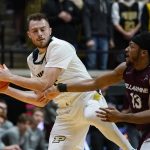 
              Purdue guard Sasha Stefanovic (55) grabs a long rebound next to Bellarmine guard Dylan Penn (13) during the first half of an NCAA college basketball game in West Lafayette, Ind., Tuesday, Nov. 9, 2021. (AP Photo/Michael Conroy)
            