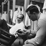 
              FILE - Sam Huff, foreground, and Don Chandler, both New York Giants' backs, relax in the dressing room at Yankee Stadium in New York on Dec. 11, 1963. Huff, the hard-hitting Hall of Fame linebacker who helped the Giants reach six NFL title games from the mid-1950s to the early 1960s and later became a popular player and announcer in Washington, died Saturday, Nov. 13, 2021. He was 87. (AP Photo/Eddie Adams, File)
            