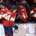 
              Florida Panthers right wing Owen Tippett (74) is congratulated by his teammates after scoring a goal during the first period at an NHL hockey game against the Minnesota Wild, Saturday, Nov. 20, 2021, in Sunrise, Fla. (AP Photo/Marta Lavandier)
            