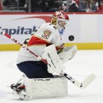 
              Florida Panthers goaltender Sergei Bobrovsky (72) stops the puck during the first period of an NHL hockey game against the Washington Capitals, Friday, Nov. 26, 2021, in Washington. (AP Photo/Nick Wass)
            