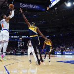 
              New York Knicks' Derrick Rose (4) shoots over Indiana Pacers' Justin Holiday (8) during the second half of an NBA basketball game Monday, Nov. 15, 2021, in New York. The Knicks won 92-84.(AP Photo/Frank Franklin II)
            