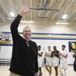 
              FILE - Saint Joseph coach Jim Calhoun smiles and waves to fans after the team's win in an NCAA college basketball game Jan. 10, 2020, in West Hartford, Conn. Calhoun, who led UConn to three national titles, has retired again, this time from Division III Saint Joseph. (AP Photo/Jessica Hill, File)
            