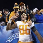 
              Tennessee tight end Miles Campbell (86) celebrates with fans after the team's win over Kentucky in an NCAA college football game in Lexington, Ky., Saturday, Nov. 6, 2021. (AP Photo/Michael Clubb)
            