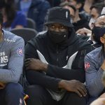 
              Injured New Orleans Pelicans forward Zion Williamson, middle, sits on the bench during the first half of the team's NBA basketball game against the Golden State Warriors in San Francisco, Friday, Nov. 5, 2021. (AP Photo/Jeff Chiu)
            