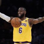 
              Los Angeles Lakers forward LeBron James (6) directs the offense during the first half of an NBA basketball game against the Houston Rockets Tuesday, Nov. 2, 2021, in Los Angeles. (AP Photo/Marcio Jose Sanchez)
            