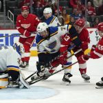 
              St. Louis Blues goaltender Ville Husso (35) stops a Detroit Red Wings left wing Tyler Bertuzzi (59) shot in the second period of an NHL hockey game Wednesday, Nov. 24, 2021, in Detroit. (AP Photo/Paul Sancya)
            