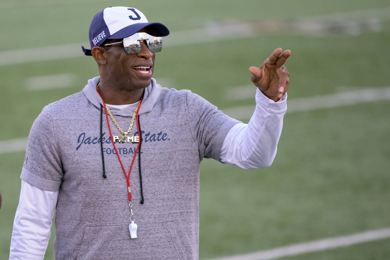 FILE - Jackson State head coach Deion Sanders points during an NCAA football game against Louisiana...