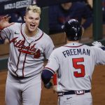 
              Atlanta Braves' Joc Pederson congratulates Freddie Freeman after he hit a solo home run in the top of the seventh inning during Game 6 of the World Series against the Houston Astros on Tuesday, Nov. 2, 2021 at Minute Maid Park. (Kevin M. Cox/The Galveston County Daily News via AP)
            