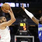 
              Los Angeles Clippers forward Nicolas Batum (33) shoots against Minnesota Timberwolves guard Jaylen Nowell (4) during the first half of an NBA basketball game Friday, Nov. 5, 2021, in Minneapolis. (AP Photo/Andy Clayton-King)
            