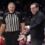
              Duke head coach Mike Krzyzewski, right, discusses a call with an official during the first half of an NCAA college basketball game against Gardner-Webb, Tuesday, Nov. 16, 2021, in Durham, N.C. (AP Photo/Chris Seward)
            