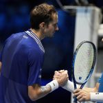 
              Daniil Medvedev of Russia shake hands with Casper Ruud of Norway, right, at the end of their ATP World Tour Finals, singles semifinal, tennis match, at the Pala Alpitour in Turin, Italy, Saturday, Nov. 20, 2021. Medvedev won 6-4/6-2. (AP Photo/Luca Bruno)
            