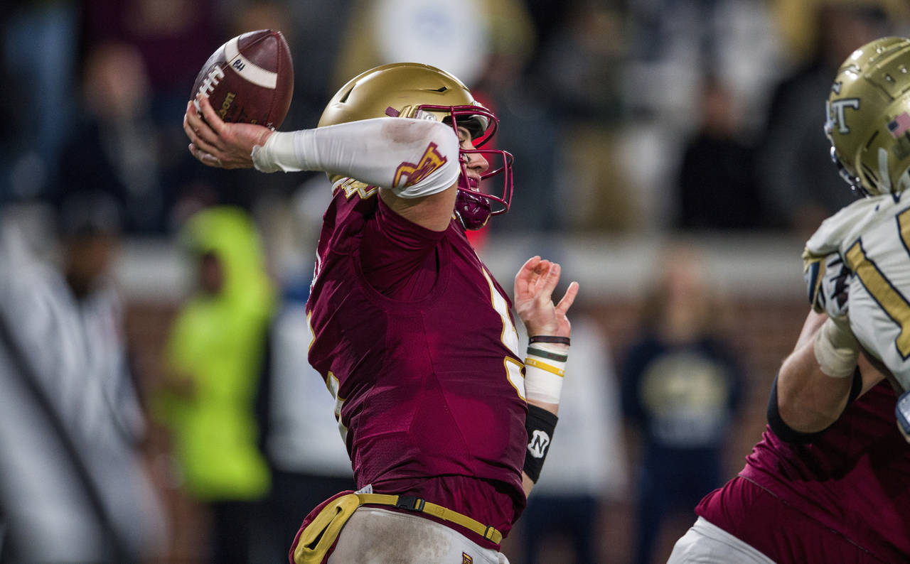 Boston College quarterback Phil Jurkovec (5) throws during the second half of an NCAA college footb...