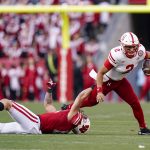 
              Wisconsin linebacker Nick Herbig stops Nebraska quarterback Adrian Martinez (2) during the first half of an NCAA college football game Saturday, Nov. 20, 2021, in Madison, Wis. (AP Photo/Andy Manis)
            