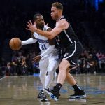 
              Brooklyn Nets forward Blake Griffin guards Orlando Magic guard Terrence Ross (31) during the second half of an NBA basketball game, Friday, Nov. 19, 2021, in New York. The Nets won 115-113. (AP Photo/Mary Altaffer)
            