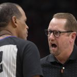 
              Toronto Raptors head coach Nick Nurse has words with referee Eric Lewis during the first half of an NBA basketball game, Saturday, Nov. 13, 2021, in Toronto. (Frank Gunn/The Canadian Press via AP)
            