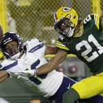 
              Green Bay Packers' Eric Stokes breaks up a pass intended for Seattle Seahawks' Tyler Lockett during the first half of an NFL football game Sunday, Nov. 14, 2021, in Green Bay, Wis. (AP Photo/Matt Ludtke)
            