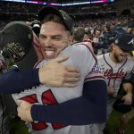 
              Atlanta Braves relief pitcher Will Smith and first baseman Freddie Freeman celebrate after winning baseball's World Series in Game 6 against the Houston Astros Tuesday, Nov. 2, 2021, in Houston. The Braves won 7-0. (AP Photo/Eric Gay)
            