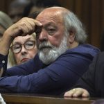 
              FILE — Parents of the late Reeva Steenkamp, June, left, and Barry right, Steenkamp, right attend court on the third day of mitigation of sentencing for Olympic runner Oscar Pistorius at the high court in Pretoria, South Africa, Wednesday, Oct. 15, 2014. Eight years after he shot dead his girlfriend, Pistorius is up for parole, but first he must meet with her parents as part of the parole procedure. A parole hearing for Pistorius was scheduled for last month and then canceled, partly because a meeting between Pistorius and Steenkamp's parents, Barry and June, had not been arranged, lawyers for both parties told The Associated Press on Monday, Nov. 8, 2021. (AP Photo/Antione de Ras. Pool)
            